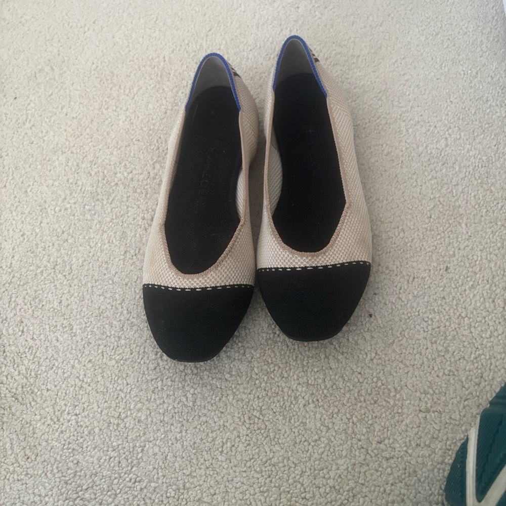 Rothy's Black and Cream Flats